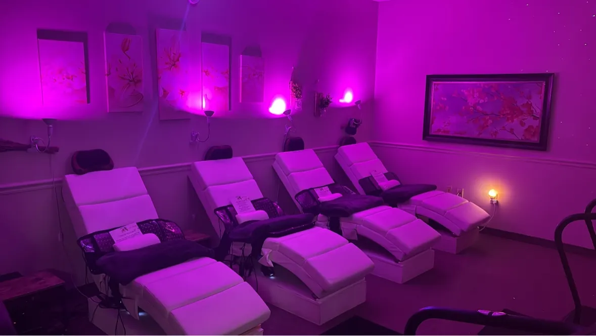 Reclining chairs and lounge lighting inside the spa