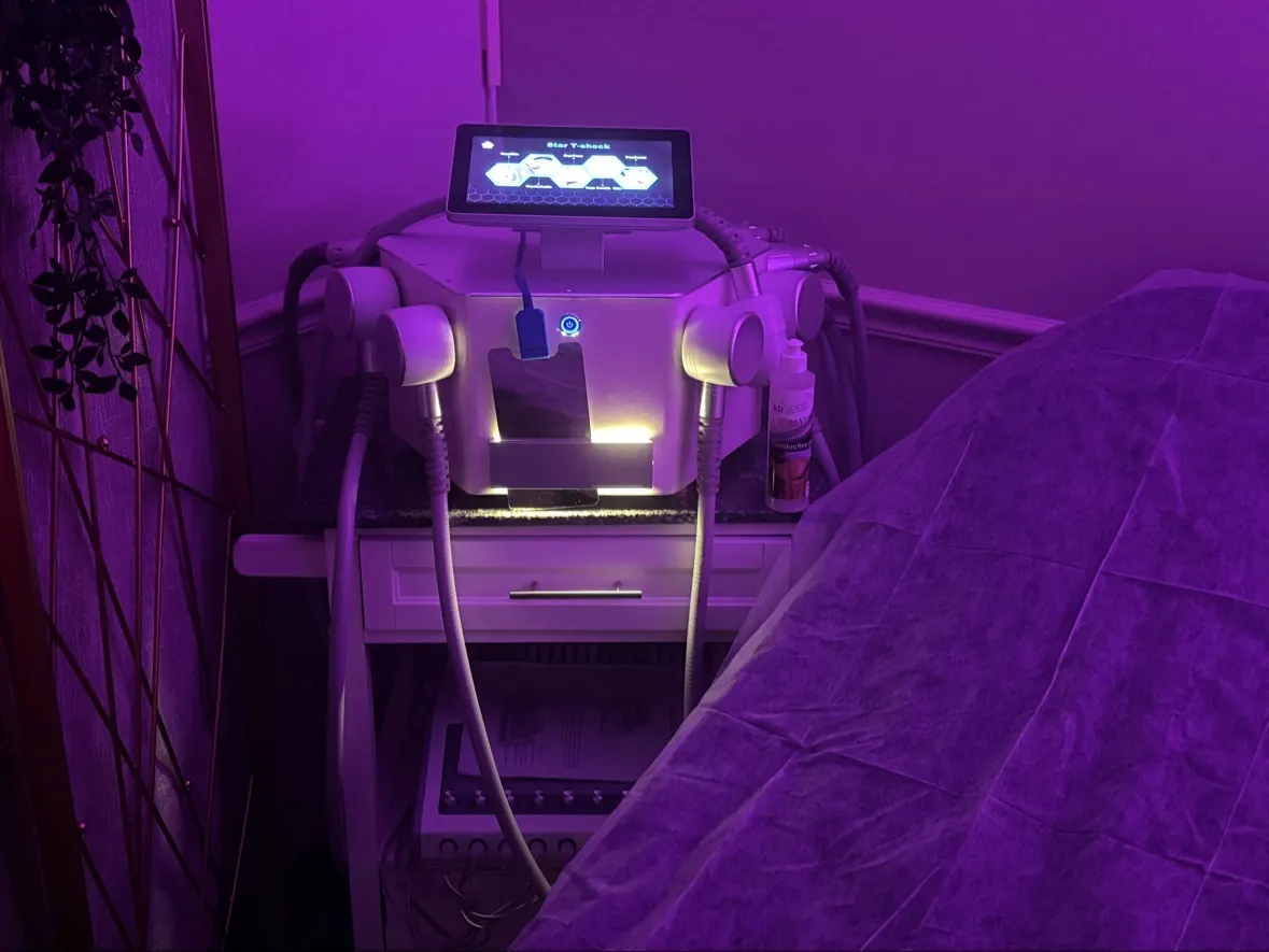 Lounge seating beneath purple lighting